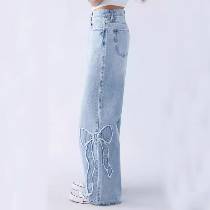 Clara - denim trousers with bow embroidery